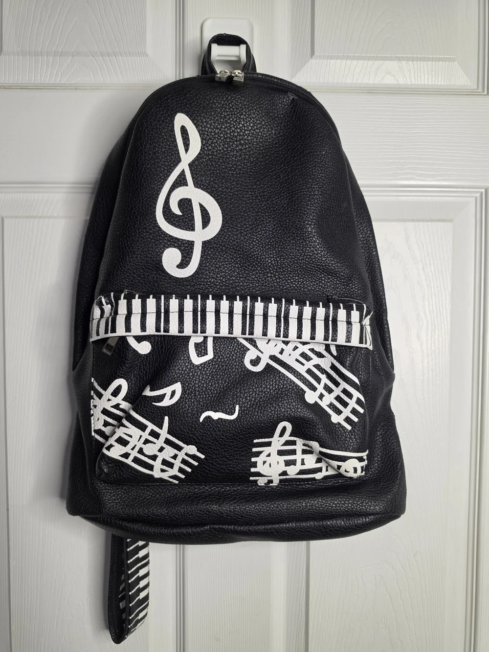 Black Musical Note Backpack with White Piano Detail